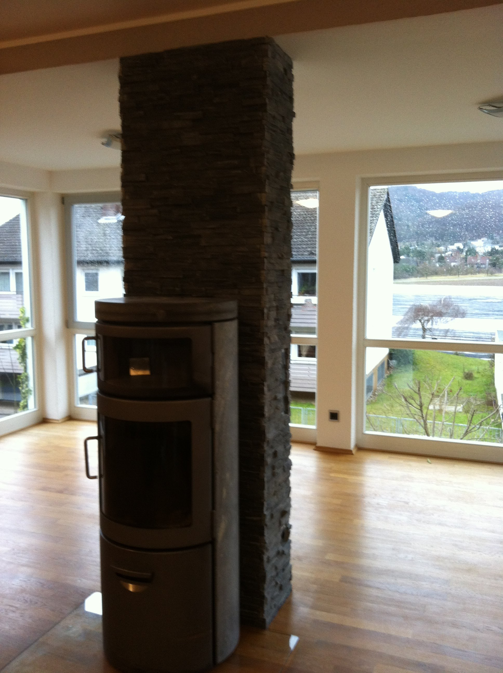 Kaminverkleidung mit Naturstein, Wohnzimmer